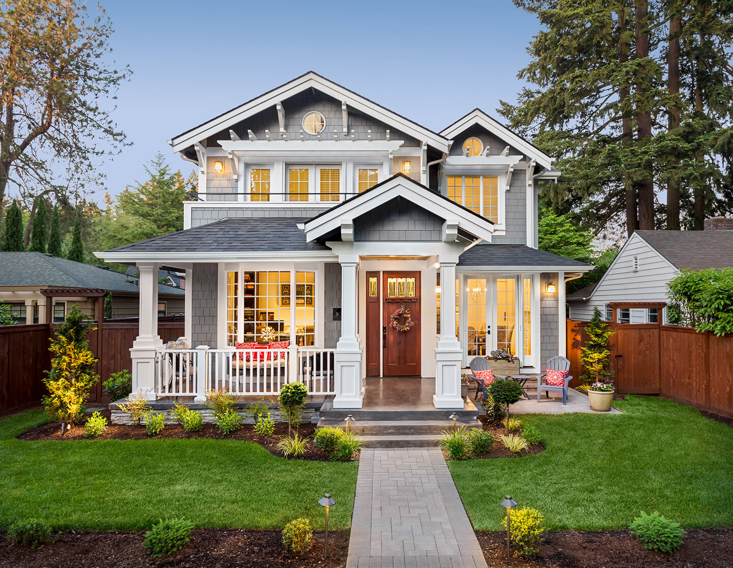 Home financed with Quaint Oak Mortgage with a large front porch and yard